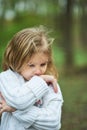 Portrait of sad unhappy little girl. Little sad child is lonesome. upset and distraught angry facial expression. Royalty Free Stock Photo