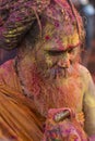 Portrait of a Sadhu baba with colourful Face at Nandgaon Temple during Holi Festival,Uttarpradesh,India