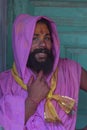 Portrait of a Sadhu baba with colourful Face at Nandgaon Temple during Holi Festival,Uttarpradesh,India