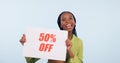 Portrait, sale and poster with a retail black woman in studio on blue background for promo discount. Smile, shopping and