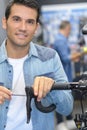 Portrait salesman in bicycle shop