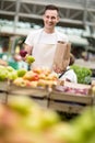 Portrait salesman offers at market store