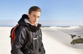 Portrait, sand dunes or woman in nature to hike for adventure, desert landscape and travel for holiday. Mockup, hiker or Royalty Free Stock Photo