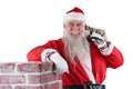 Portrait of santa Claus carrying bag full of gifts Royalty Free Stock Photo