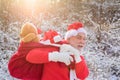 Portrait of Santa Claus coming to the winter forest with a bag of gifts, snow landscape. Royalty Free Stock Photo