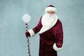 Portrait of Santa Claus on a gray background.