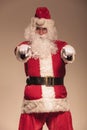 Portrait of Santa Claus pointing at the camera Royalty Free Stock Photo