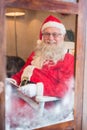 Portrait of santa claus reading novel during christmas time Royalty Free Stock Photo