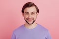 Portrait of satisfied attractive young man happy positive smile wear casual outfit isolated over pink color background