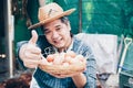 Portrait of satisfied excited hard-working delightful rejoicing handsome friendly kind farmer holding small basket