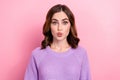 Portrait of satisfied funny positive girl with curly hairdo wear violet pullover pouted lips kiss isolated on pink color