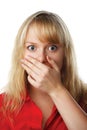 Portrait of scared woman covering mouth with hand