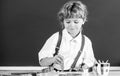 Portrait school kid boy doing art homework, holding pencil, writing. Child boy drawing on elementary school. Kids art Royalty Free Stock Photo