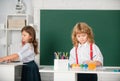 Portrait school kids doing art homework. Children drawing on elementary school. Cute kids draw with colorful crayons. Royalty Free Stock Photo