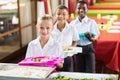Portrait of school kids having lunch during break time Royalty Free Stock Photo