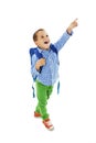 Portrait of a schoolboy with backpack is pointing up Royalty Free Stock Photo