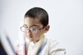 Portrait of schoolboy doing homework Royalty Free Stock Photo