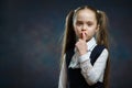 Portrait of Schoolgirl Show Keep Silence Sign Royalty Free Stock Photo