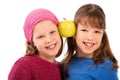 Portrait of schoolgirls with apple Royalty Free Stock Photo