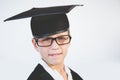 Portrait of schoolkid pretending to be graduate