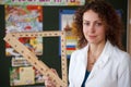 Portrait of schoolteacher in blouse in school Royalty Free Stock Photo