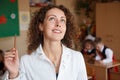 Portrait of schoolteacher in blouse in school