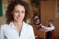 Portrait of schoolteacher in a white blouse Royalty Free Stock Photo