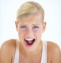 Portrait, screaming and woman scared, fear and yelling isolated on a white studio background. Face, shouting and blonde