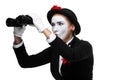 Portrait of the searching mime with binoculars