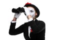 Portrait of the searching mime with binoculars