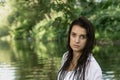 Portrait of a seductive girl posing with wet loose hair outdoors Royalty Free Stock Photo