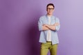 Portrait of self-assured confident guy crossed arms fit form on purple background Royalty Free Stock Photo