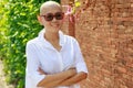 Portrait self confidence asian woman with bald head after cancer