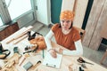 Portrait of self employed female carpenter in her woodwork workshop