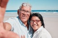 Portrait, selfie and elderly couple at a beach for travel, vacation and bonding against ocean background. Face, love and Royalty Free Stock Photo