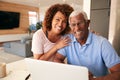 Portrait Of Senior African American Couple Using Laptop To Check Finances At Home Royalty Free Stock Photo