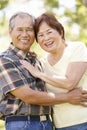 Portrait senior Asian couple in park Royalty Free Stock Photo