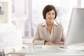 Portrait of senior businesswoman at office desk Royalty Free Stock Photo