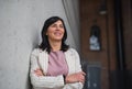 Portrait of senior businesswoman standing indoors in office. Royalty Free Stock Photo