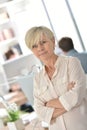 Portrait of senior businesswoman standing at office Royalty Free Stock Photo