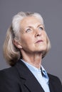 Portrait of senior businesswoman standing in suit Royalty Free Stock Photo