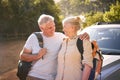 Portrait Of Senior Couple Going For Hike In Countryside Standing By Car Together Royalty Free Stock Photo