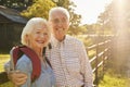 Portrait Of Senior Couple Hiking In Countryside Together Royalty Free Stock Photo