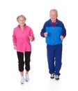 Portrait of senior couple jogging