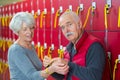 Portrait senior couple in locker-room before gym Royalty Free Stock Photo