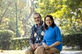 Portrait of senior couple smiling at park