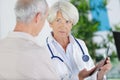 portrait senior doctor talk with elderly patient Royalty Free Stock Photo