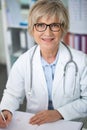 portrait senior doctor at work looking at camera Royalty Free Stock Photo