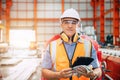 Portrait senior engineer male supervisor working in heavy metal manufactory hand holding tablet Royalty Free Stock Photo