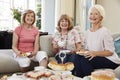 Portrait Of Senior Female Friends Enjoying Afternoon Tea At Home Royalty Free Stock Photo